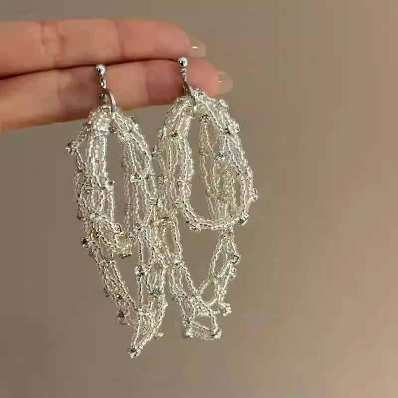 Sparkle Bow Tassel Earrings