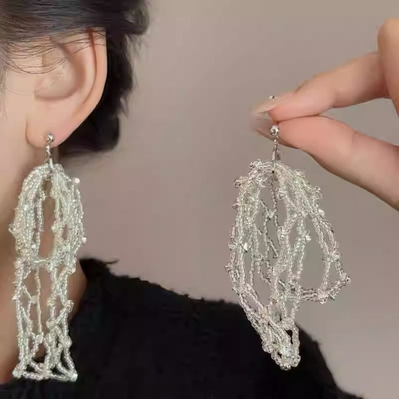 Sparkle Bow Tassel Earrings