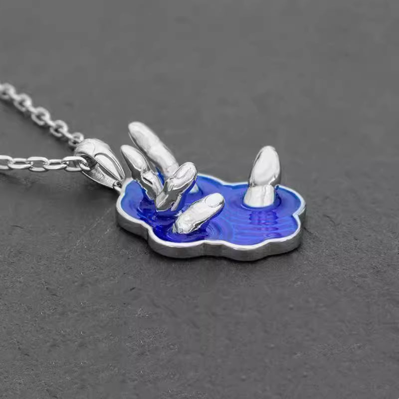 CHICI VANGO Emerging Hand Necklace