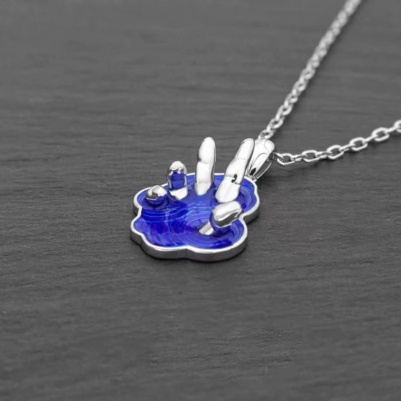 CHICI VANGO Emerging Hand Necklace